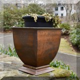 L13. One of a pair of copper planters. 